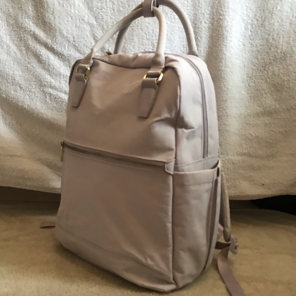 Open story light purple backpack